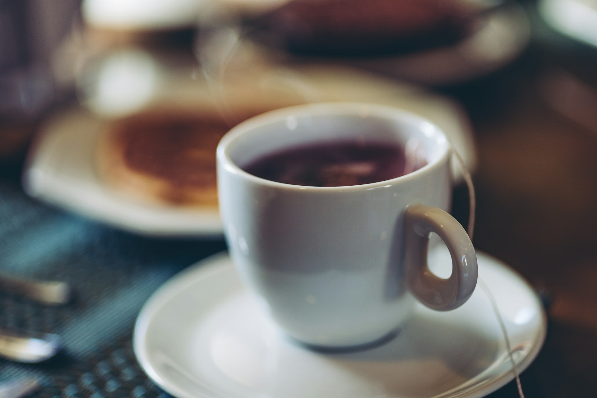 a cup of coffee sitting on top of a saucer